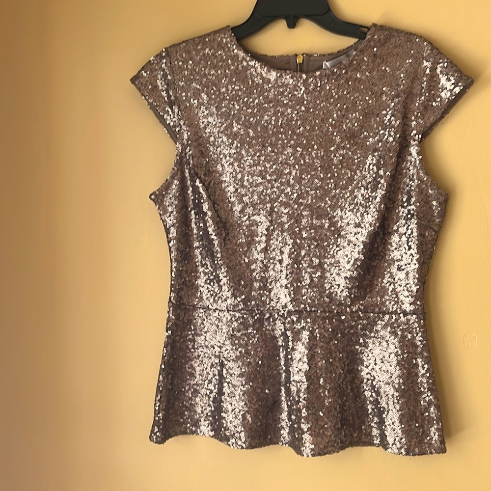 Lovely beige sequined formal top. 100% polyester stretchy top. Back zipper.